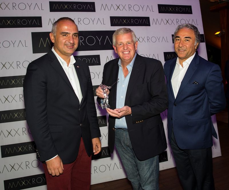 Colin Montgomerie is presented with a crystal ornament by Mehmet Ersoy and Cahit Sahin from Maxx Royal