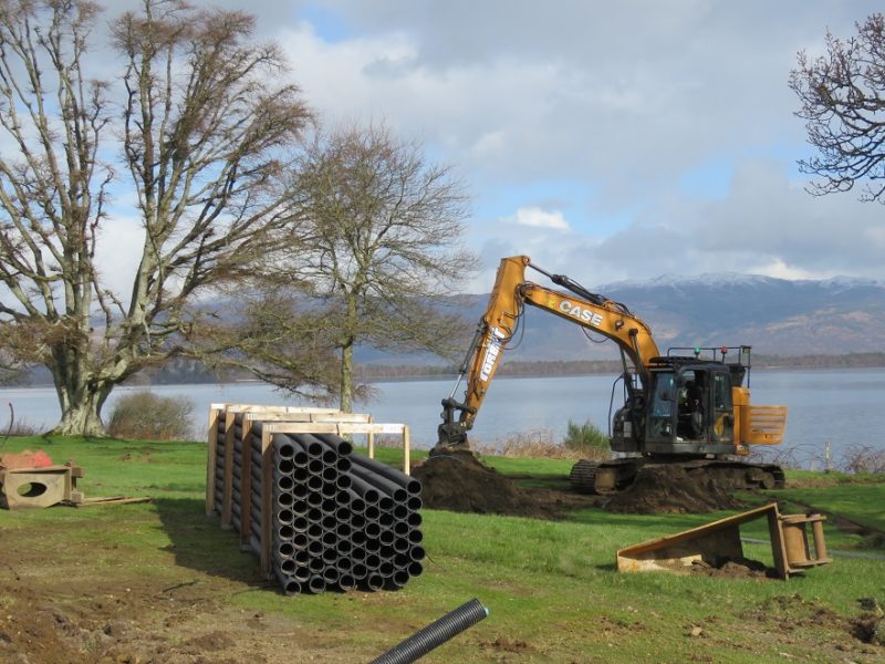 Fitting drainage pipes at Loch Lomond BIGGA online conference