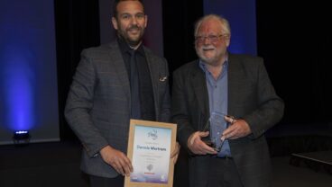 BIGGA Dennis Mortram was presented with the Outstanding Contribution of the Year Award by Steven Nixon of Bernhard and Company