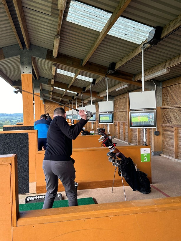 Mearns Castle Golf Academy Toptracer Range with practicing golfers