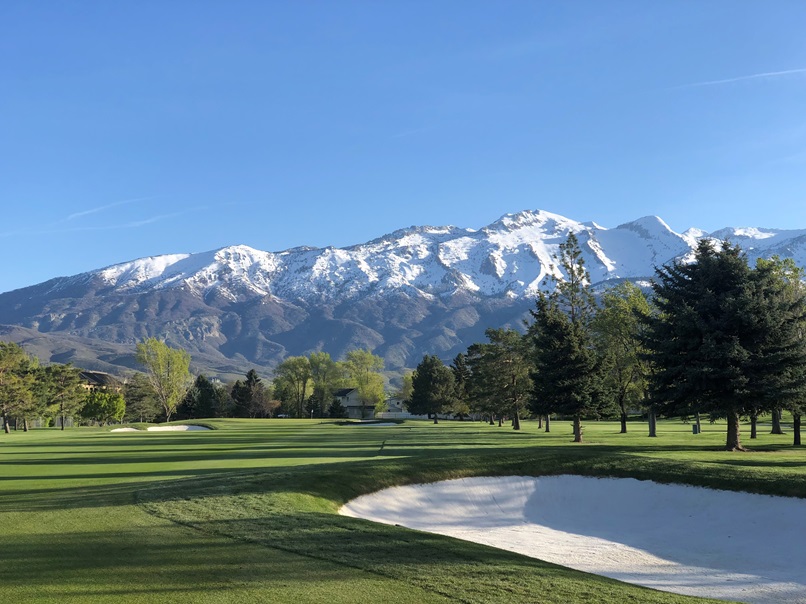 Alpine Country Club with snowy mountain